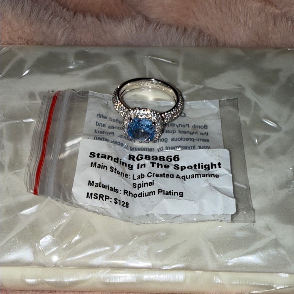 BP Rhodium Ring with Blue Stone